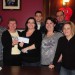 Far left – Angela Hourie (executive) Betty Roe (president) Kora-Lee Thornsteinson receiving the cheque and family members in attendance.